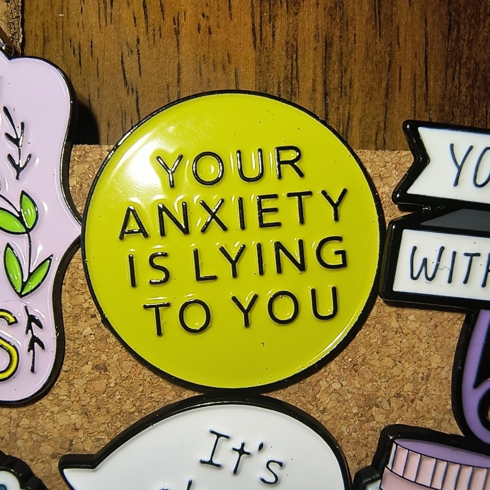 Yellow 'Your Anxiety Is Lying To You' Enamel Pin